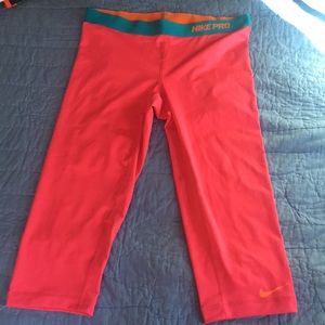 Large pink Nike Pro 3/4 length leggings